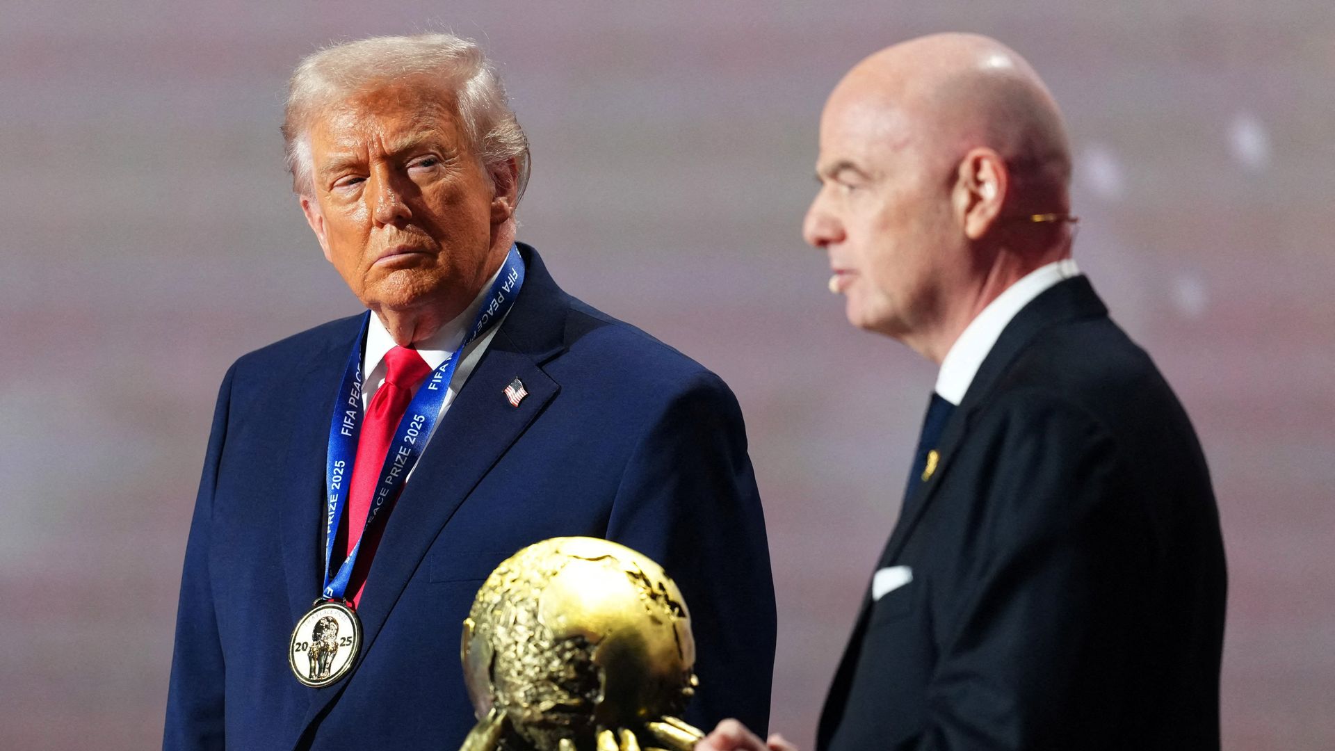 Donald Trump awarded FIFA peace prize at World Cup draw